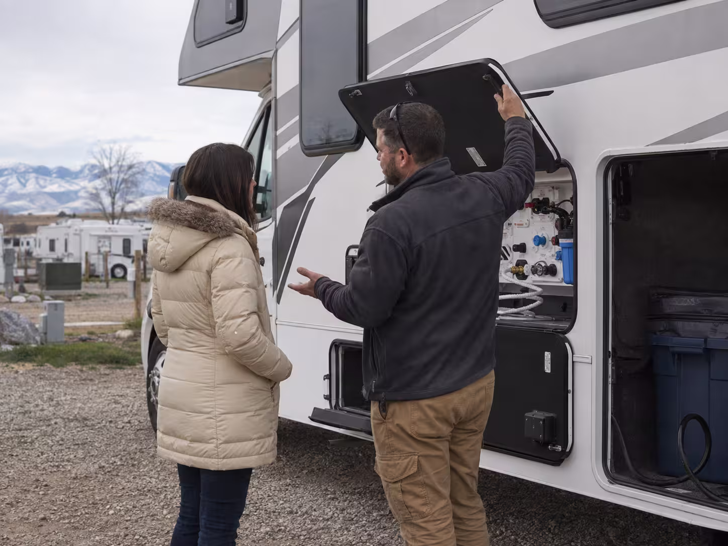 Manager reviewing RV setup for a long term Denver renter