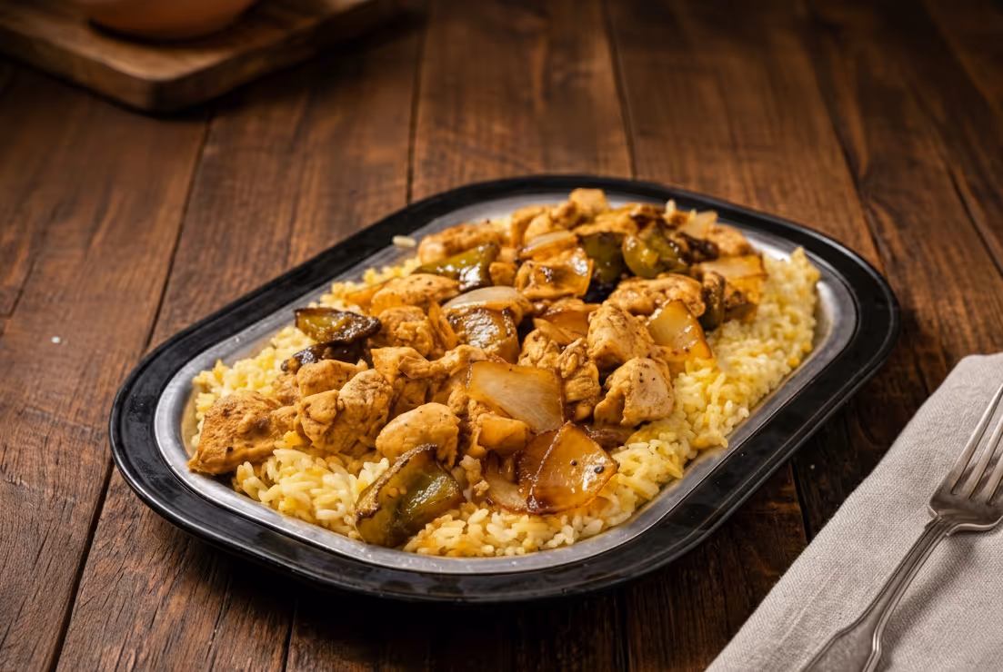 Marinated Chicken over Rice Pilaf