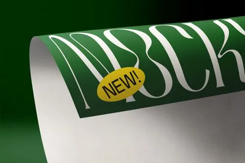 Green poster curled at the edge with a green background