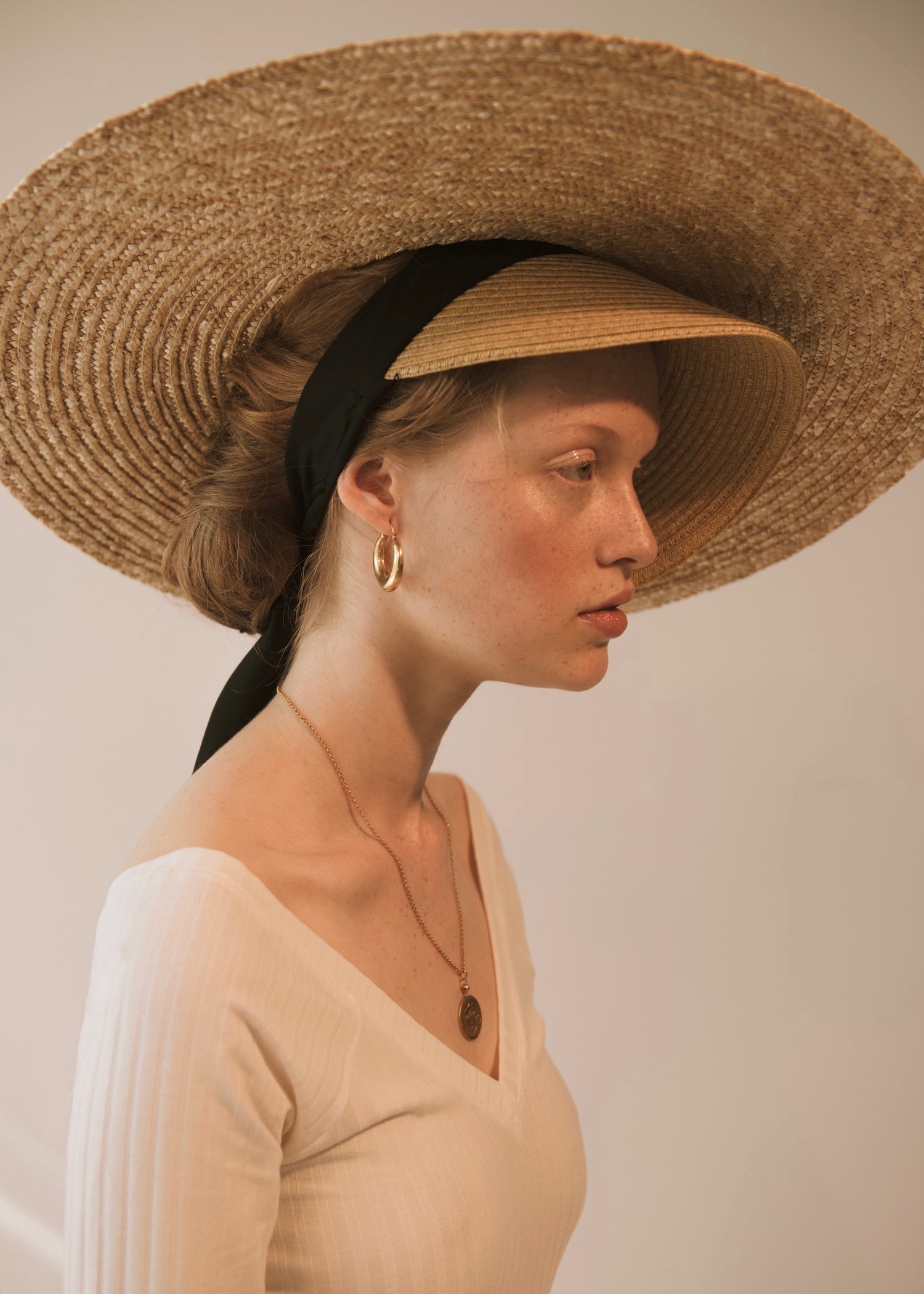 Green poster curled at the edge with a green background