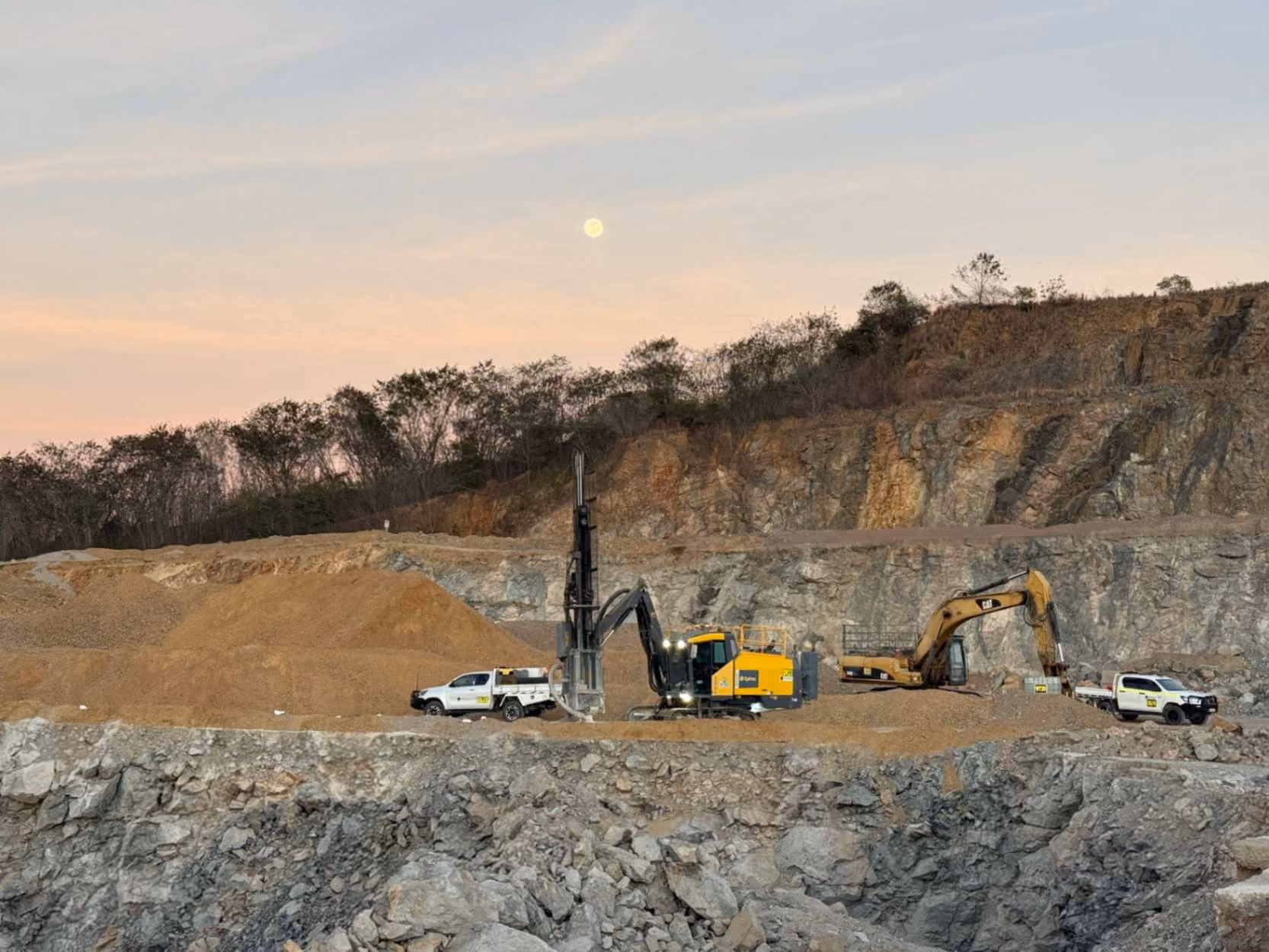 Drill Rig with moon on quarry