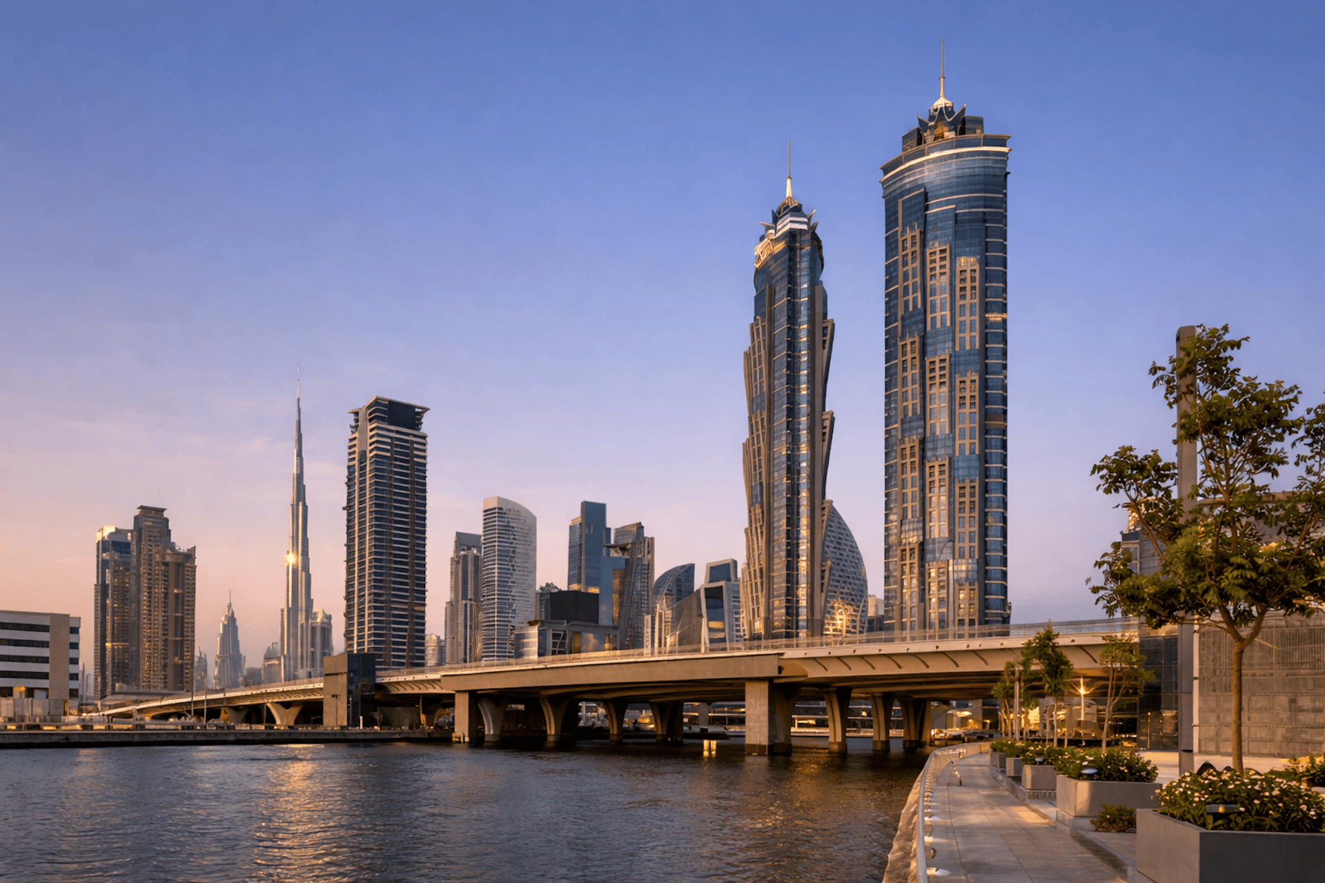 Dubai skyline with modern skyscrapers, bridge over water at golden hour sunset