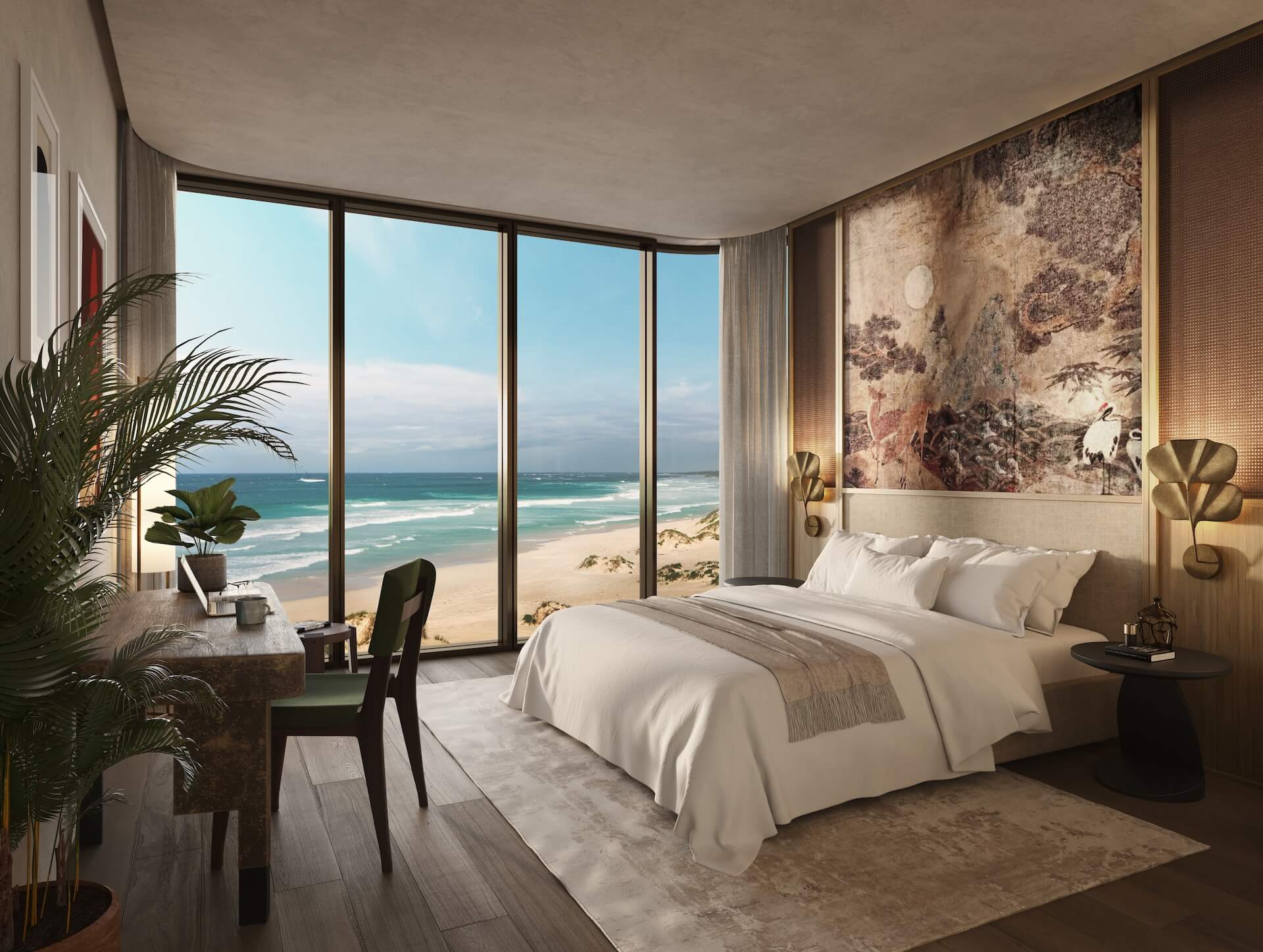 Luxury beachfront bedroom with modern furnishings and panoramic ocean views through floor-to-ceiling windows
