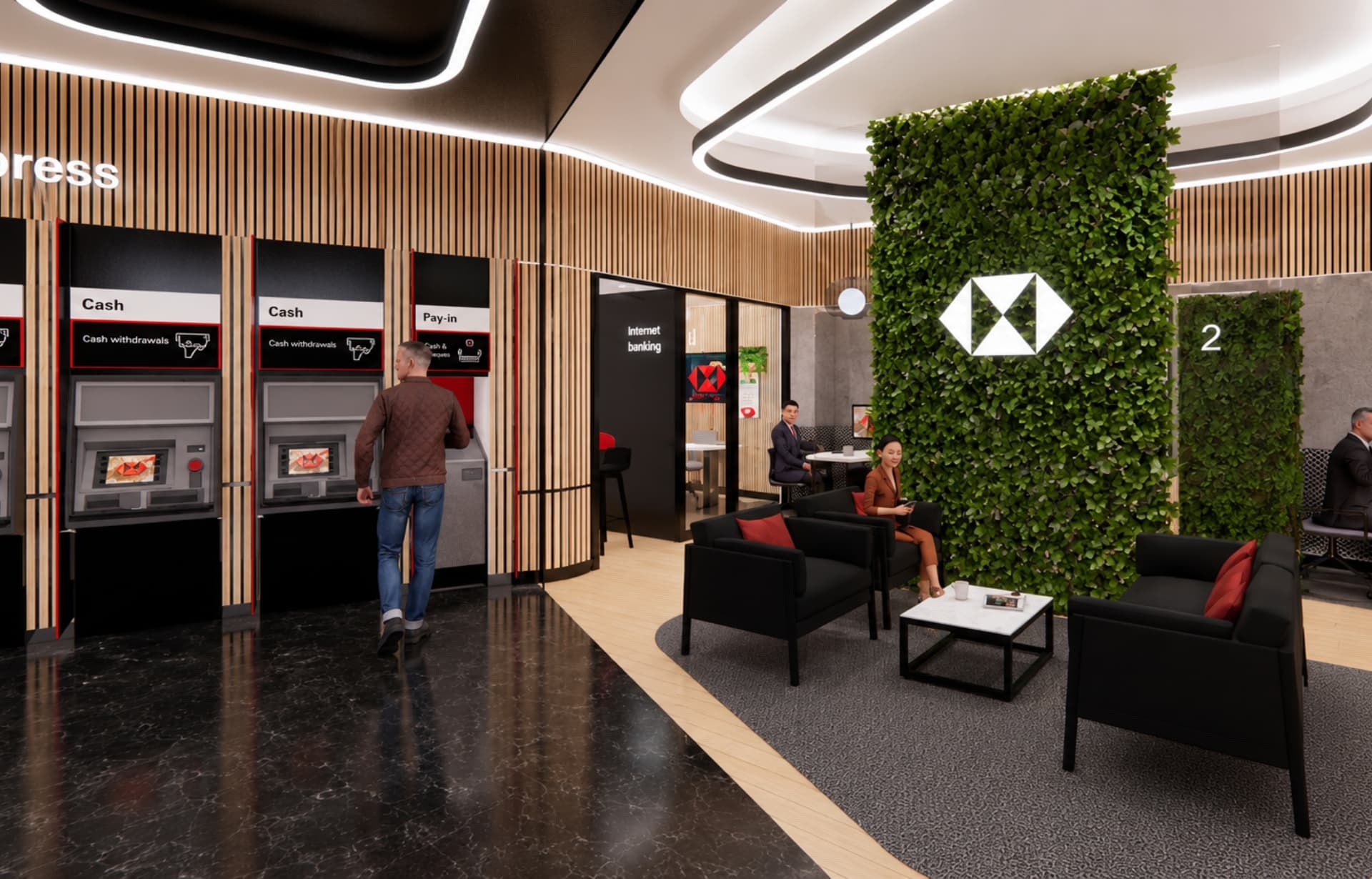 Modern bank branch interior with ATMs, seating area, green wall, and customers