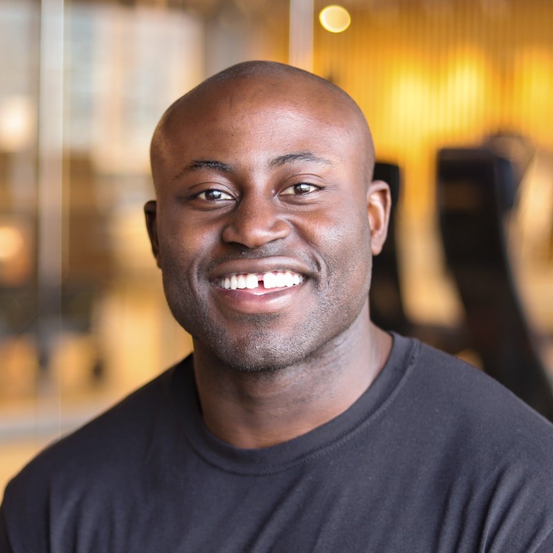 [headshot] image of satisfied customer shaking hands with company representative (for a fintech company)