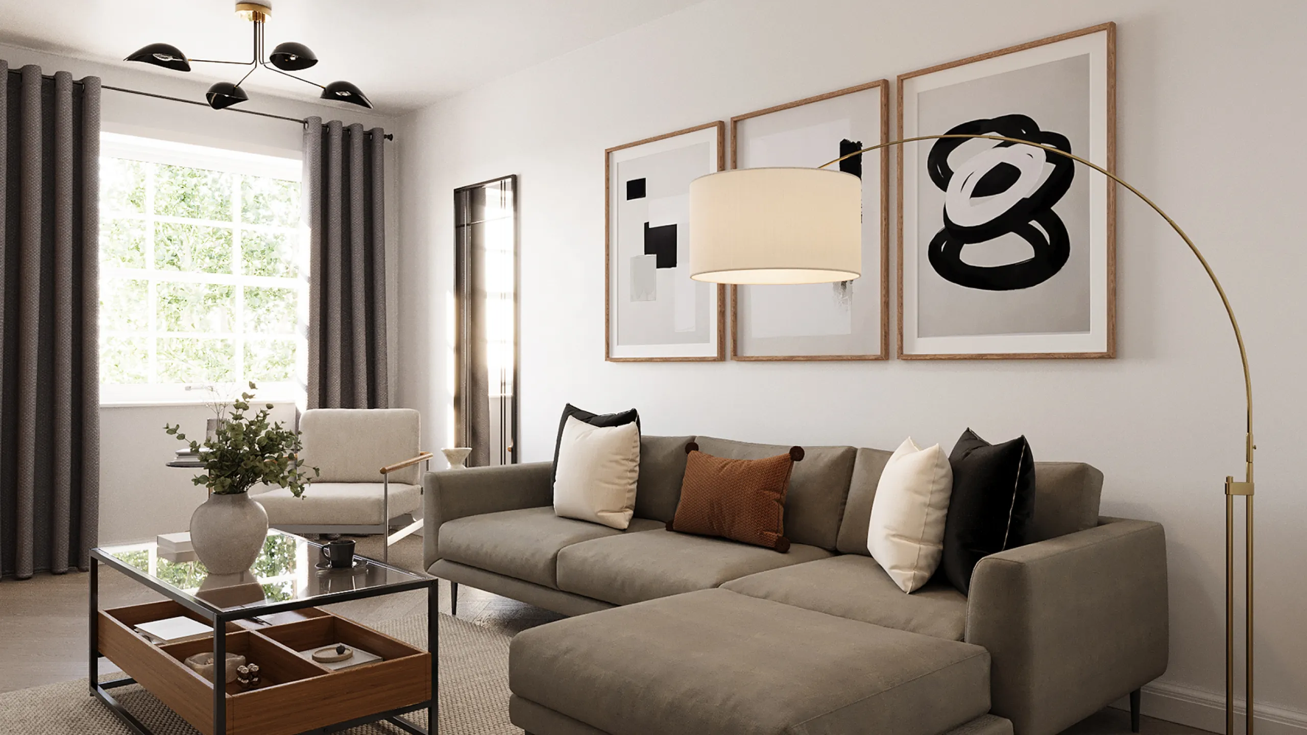 Modern living room with a gray sectional sofa, black and white cushions, a glass coffee table with a vase, a beige armchair, and abstract black and white framed art on the wall.
