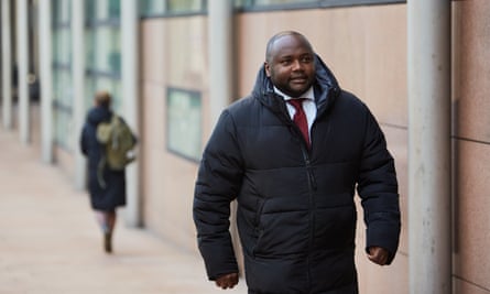 Mpanzu Bamenga, a victim of ethnic profiling, arrives at The Hague Palace of Justice before the verdict on ethnic profiling by the Royal Military Police on Dutch borders, on 14 February 2023.