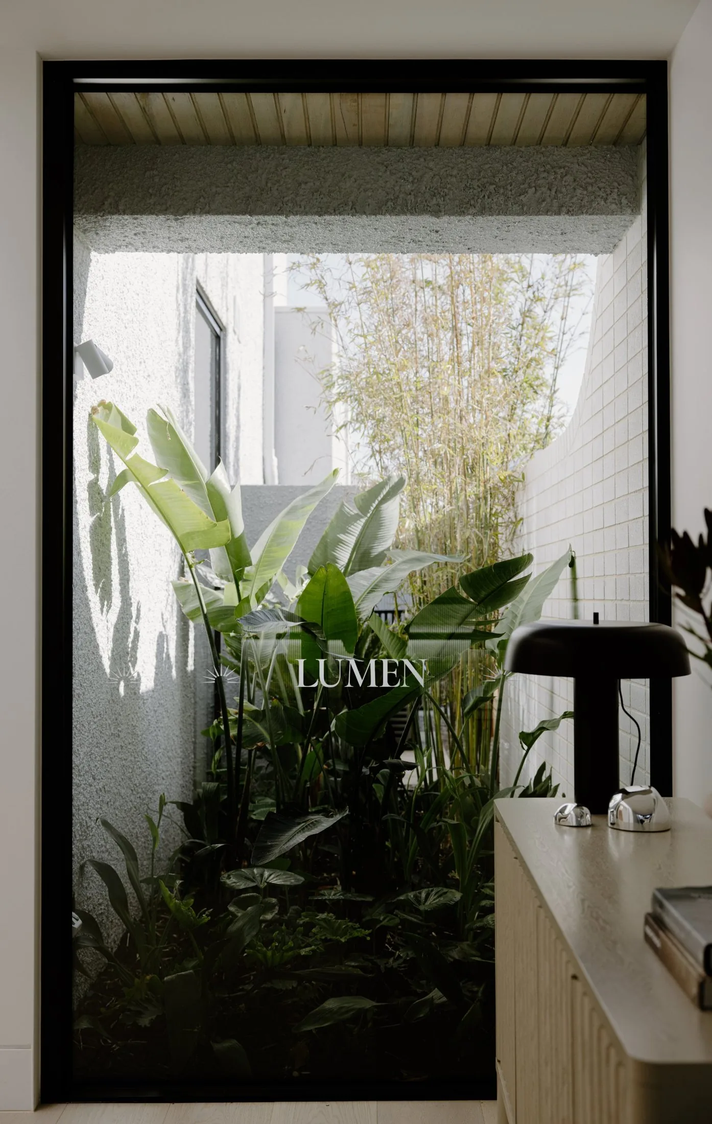 Lumen, the courtyard garden through the etched glass
