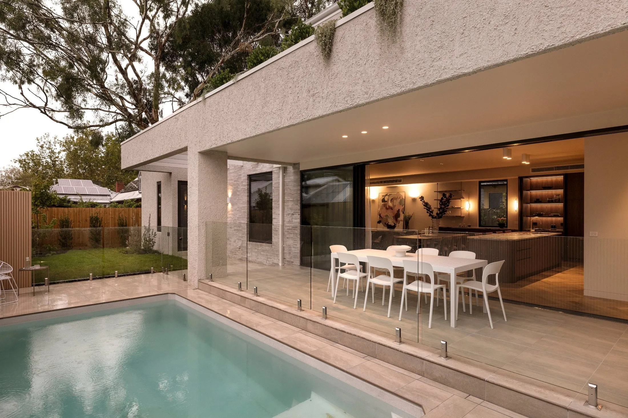 Arbour, the pool and alfresco at dusk