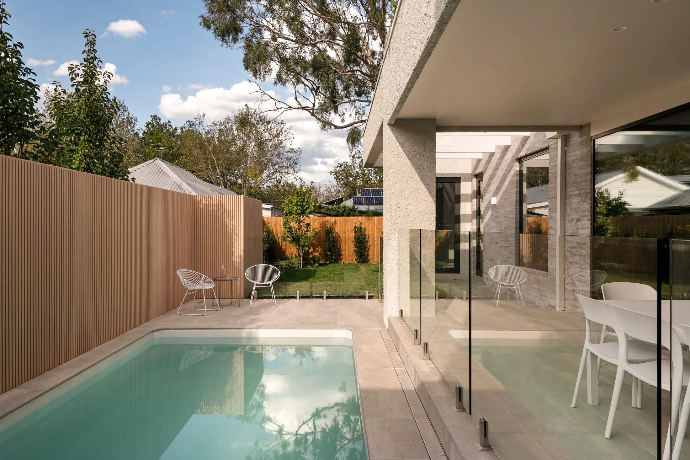 Arbour, the pool by day