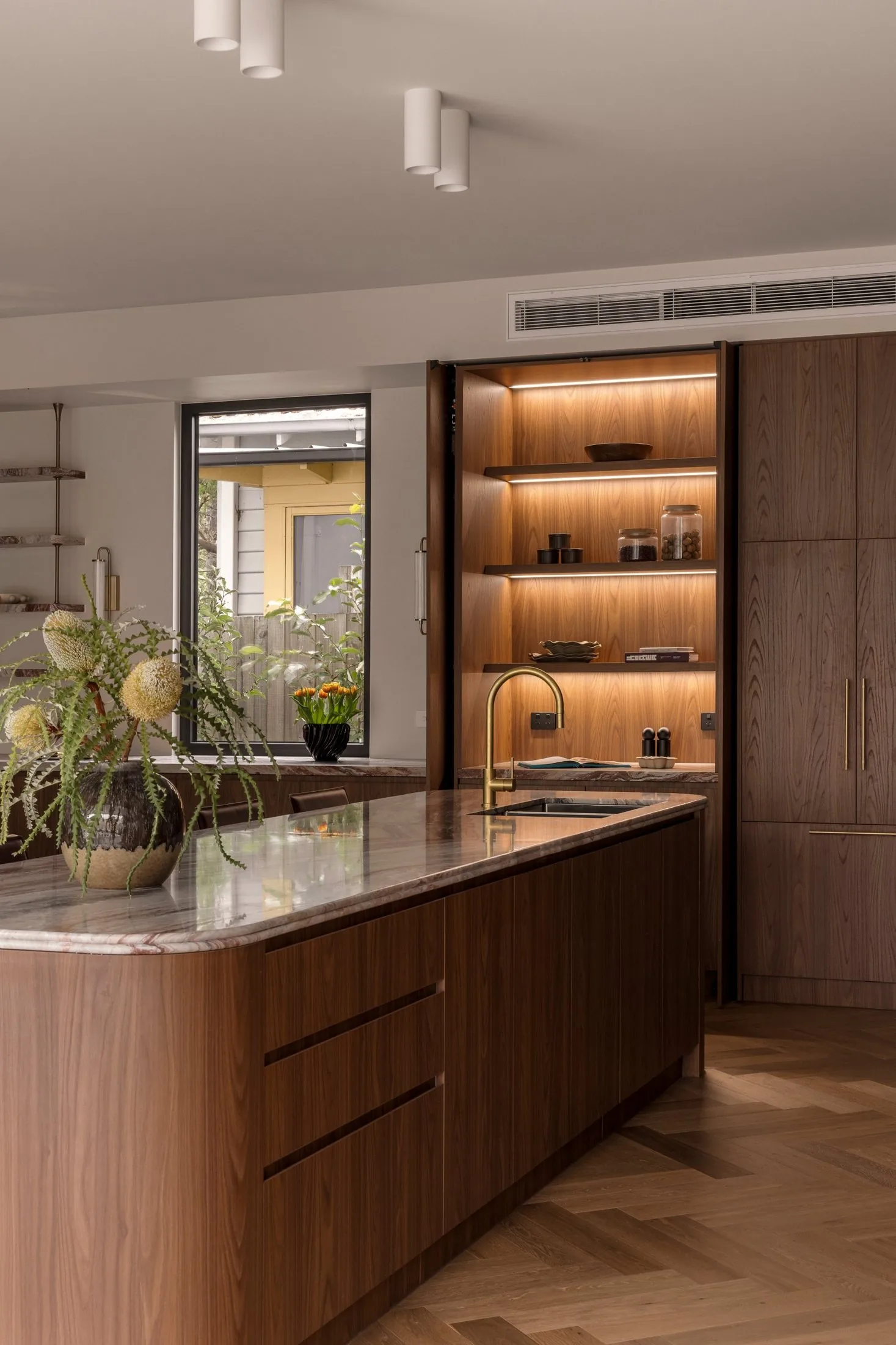Arbour, the kitchen island and lit joinery