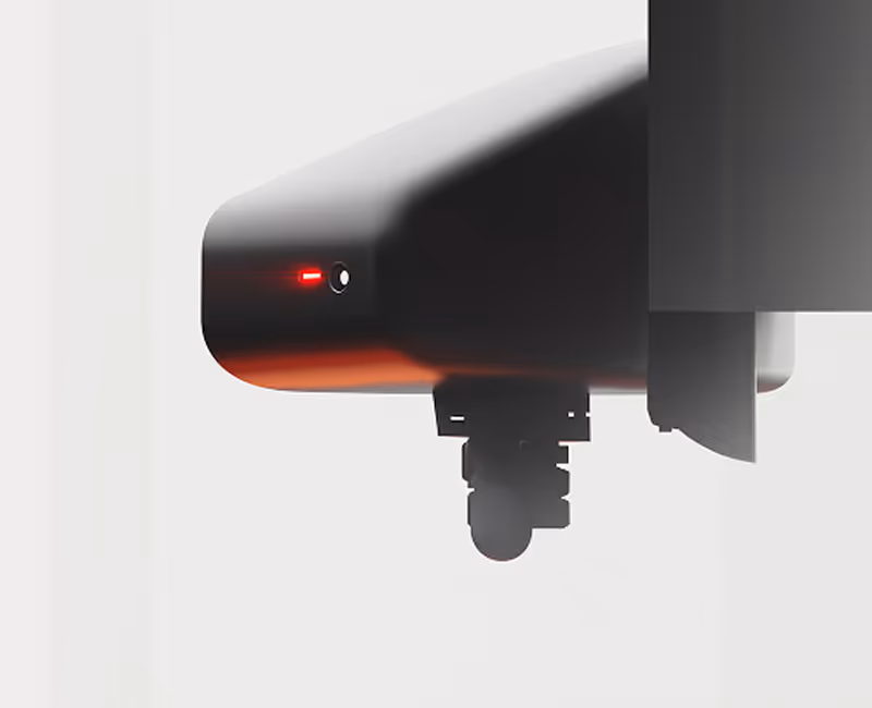 Close-up of a black security camera with a red light and mounting bracket on a white background.