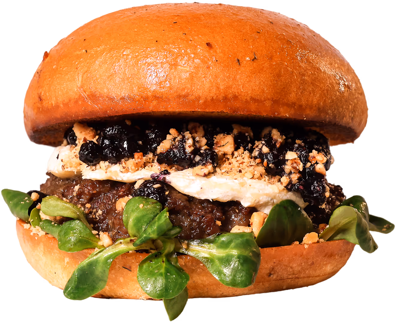 Burger with crispy bacon, melted cheese, fried onions, lettuce, and creamy sauce dripping from the toasted bun.