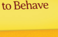 Partial text on a yellow background with a brown horizontal surface below.