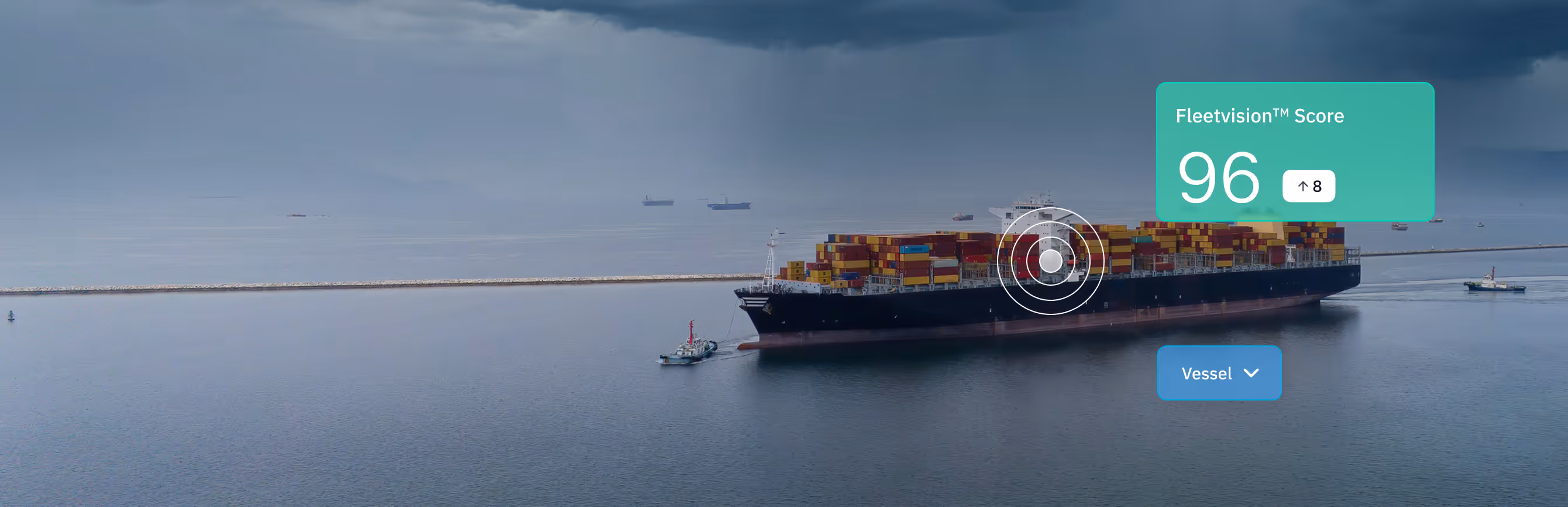 Large container ship in calm water with multiple colorful shipping containers and a tugboat beside it under a cloudy sky.
