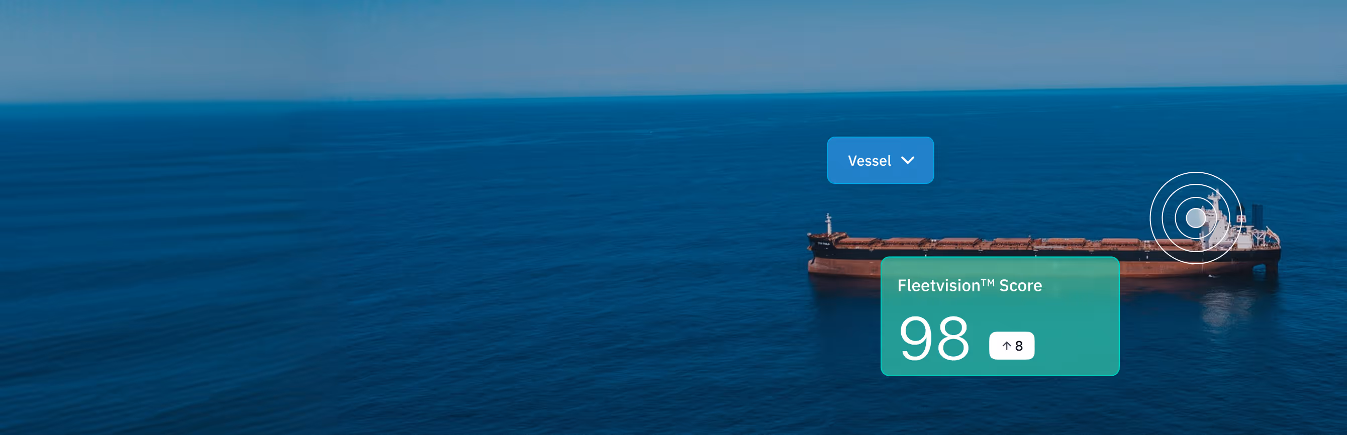 A large cargo vessel on calm blue ocean water with Fleetvision Score 98 displayed next to it.