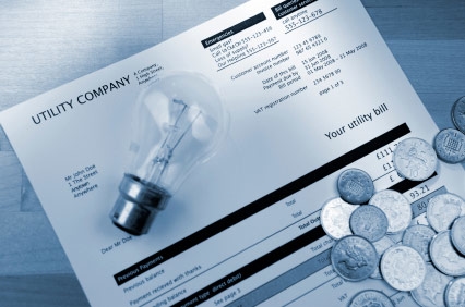 utility bill with light bulb and money on it