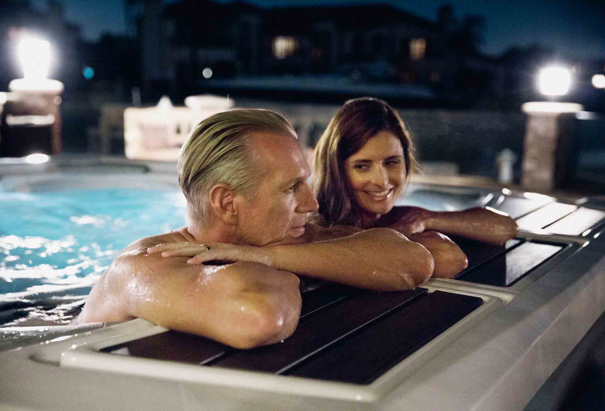 Couple relaxing in hot tub