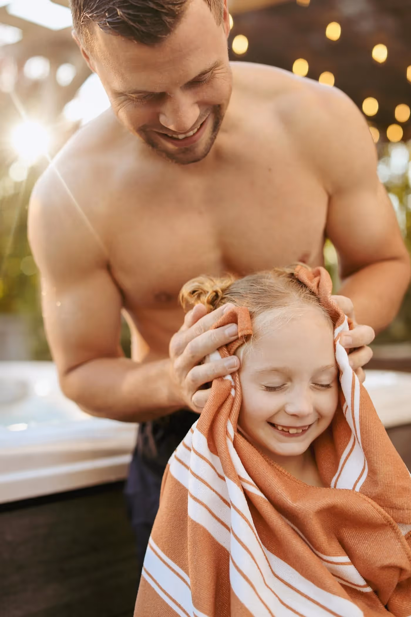 Family outside the hot tub