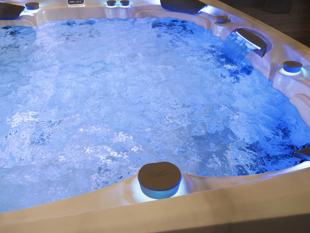 Sundance Spa hot tub on a spacious wooden deck