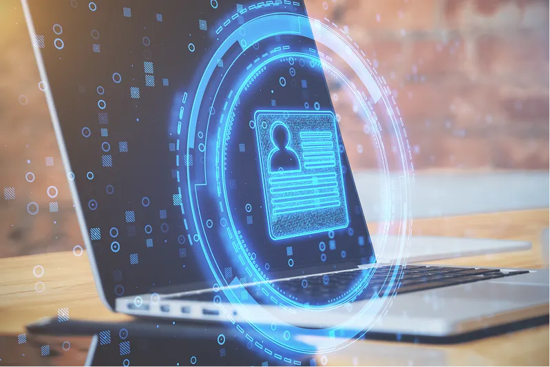 Laptop with a digital identity protection graphic overlay