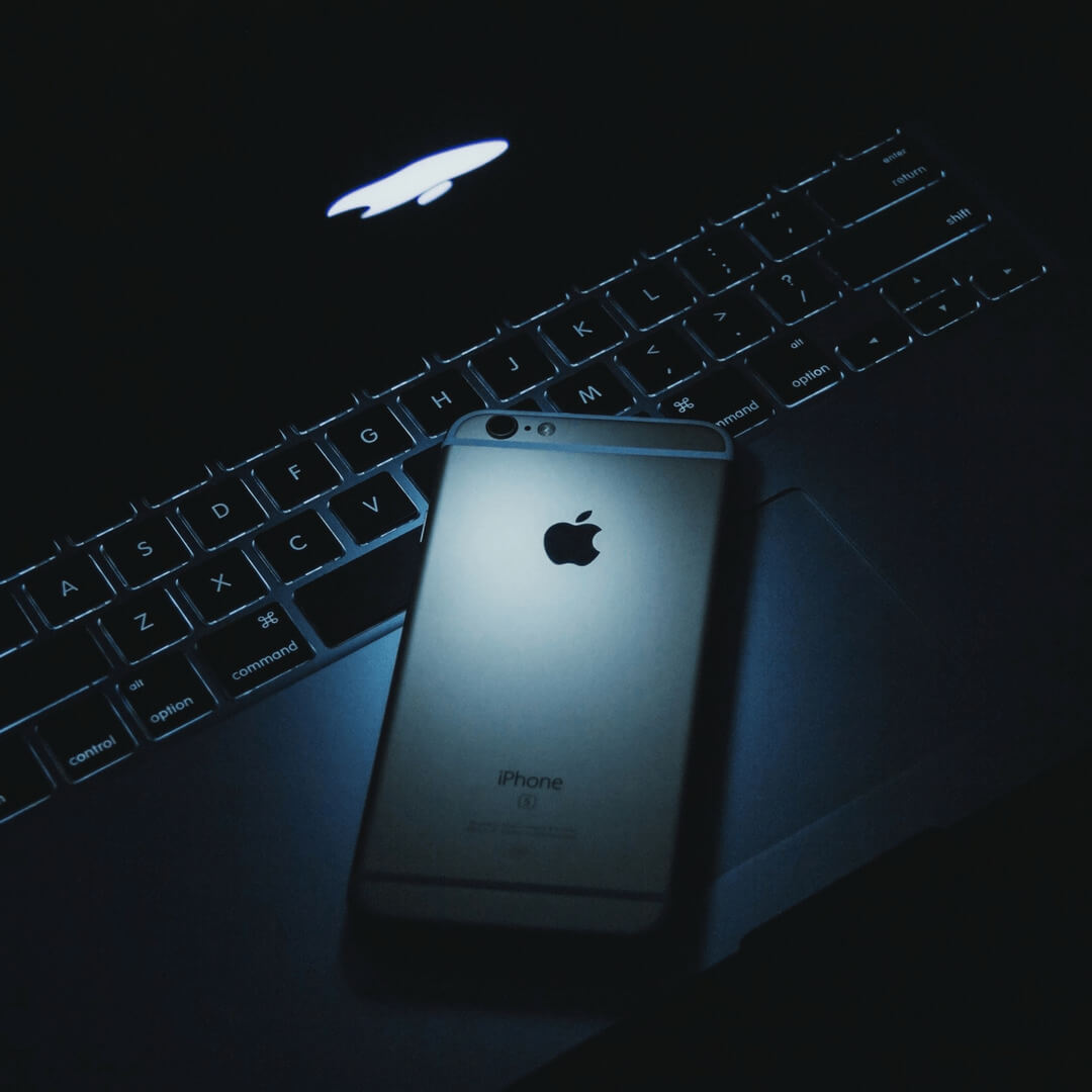 iphone on laptop keyboard