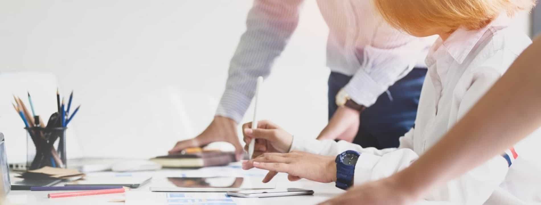 Employees collaborating in a digital workplace using connected communication tools