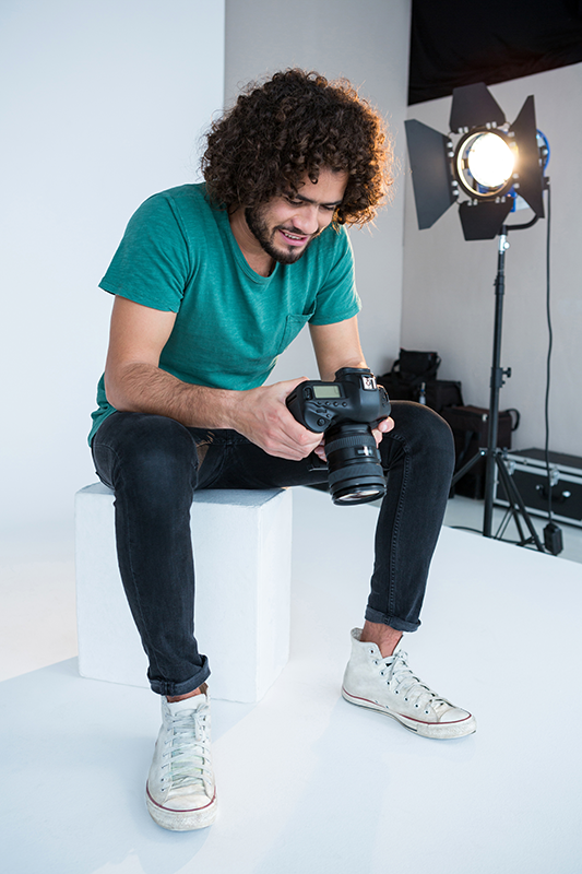 Photographer in photographic studio
