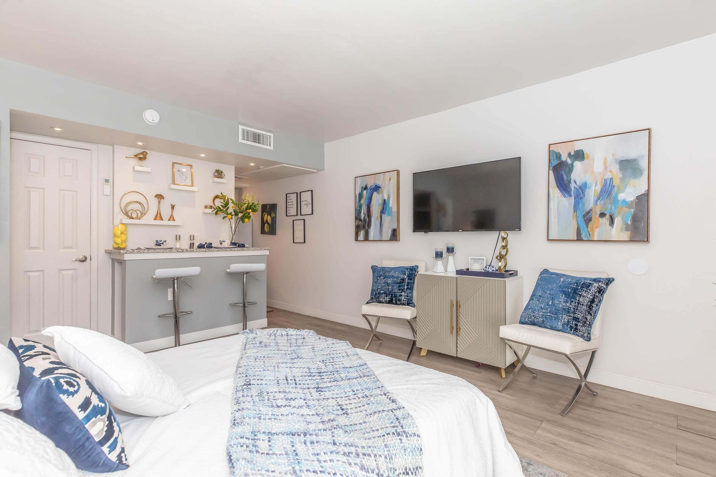 Studio bedroom area with bed