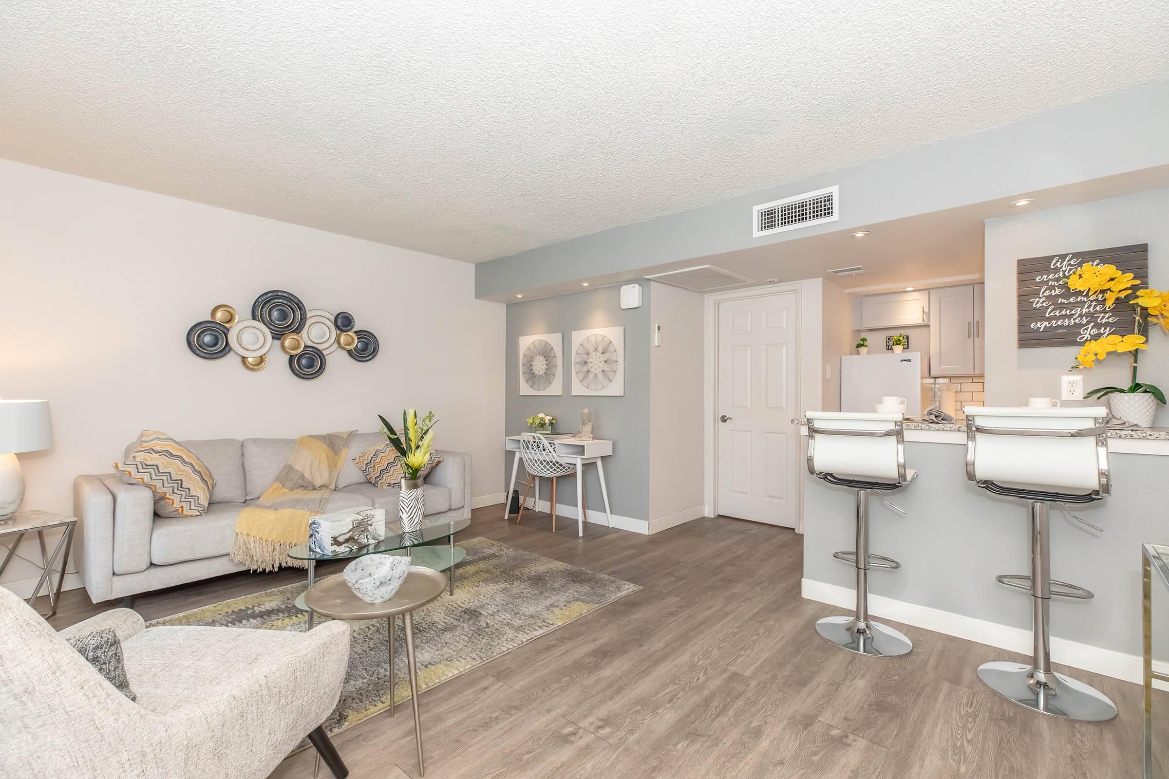 One bedroom dinning room area with bar stools