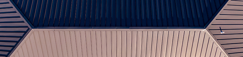 An image of a metal clad industrial roof peak.