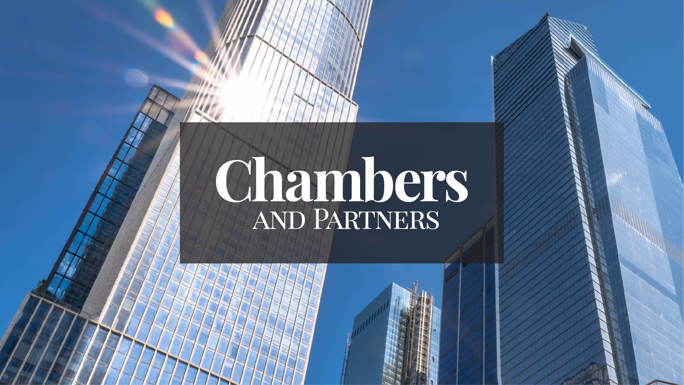 Looking up at buildings with Chambers logo