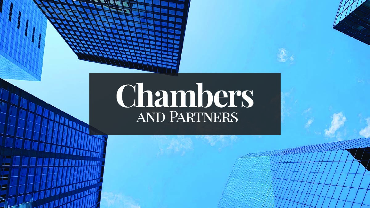 Looking up at buildings with Chambers logo