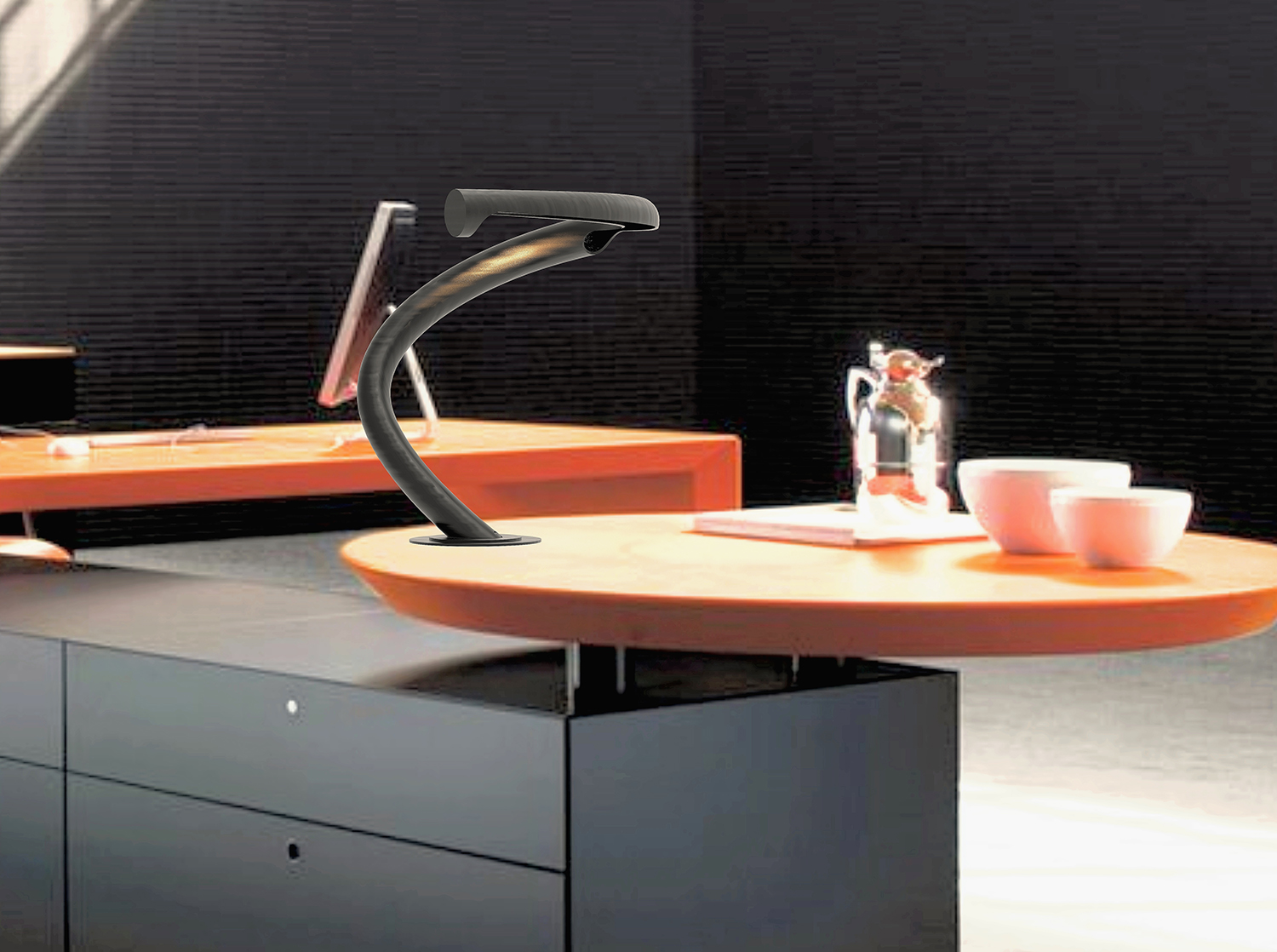 A spiral shaped lamp on a desk