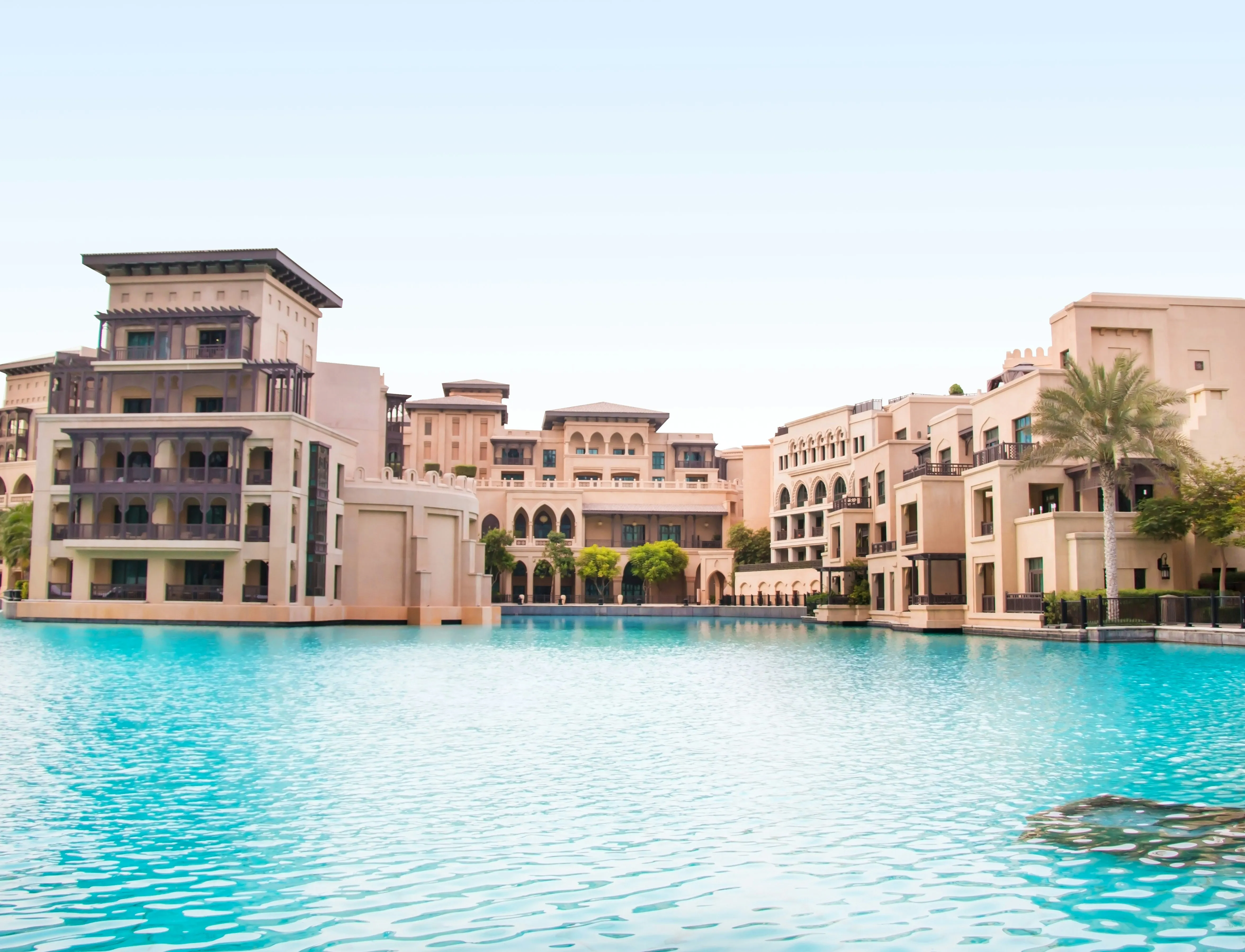 Luxury hotel property exterior with pool — hotel acquisition due diligence beyond financial assessment