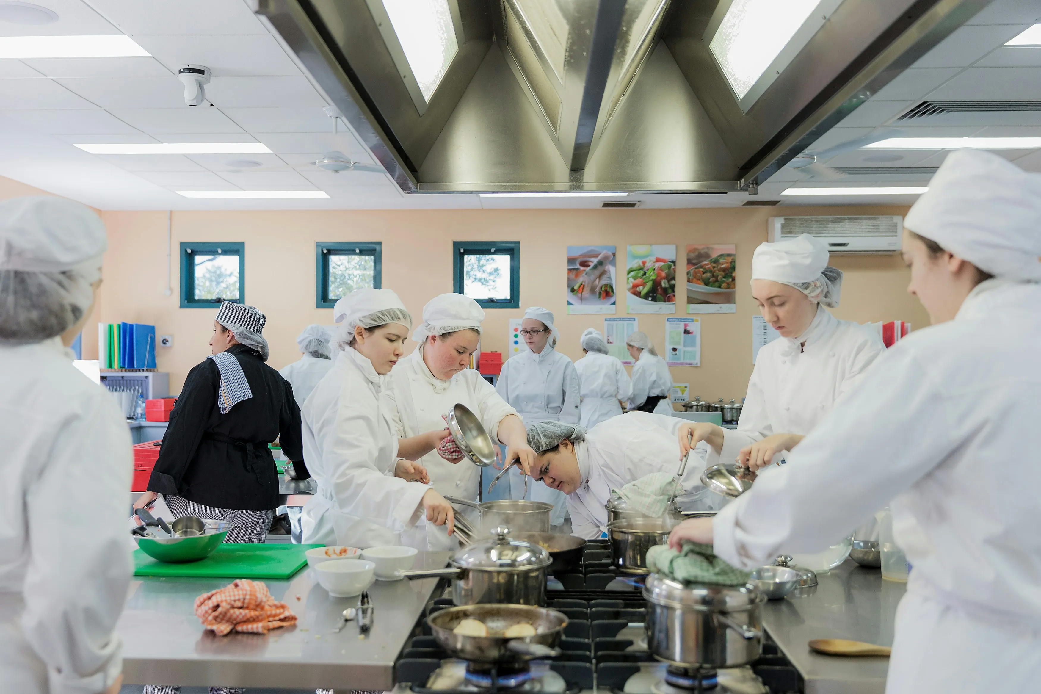 Trainee chefs in a food safety training kitchen — the gap between food safety certification and operational competence in hospitality