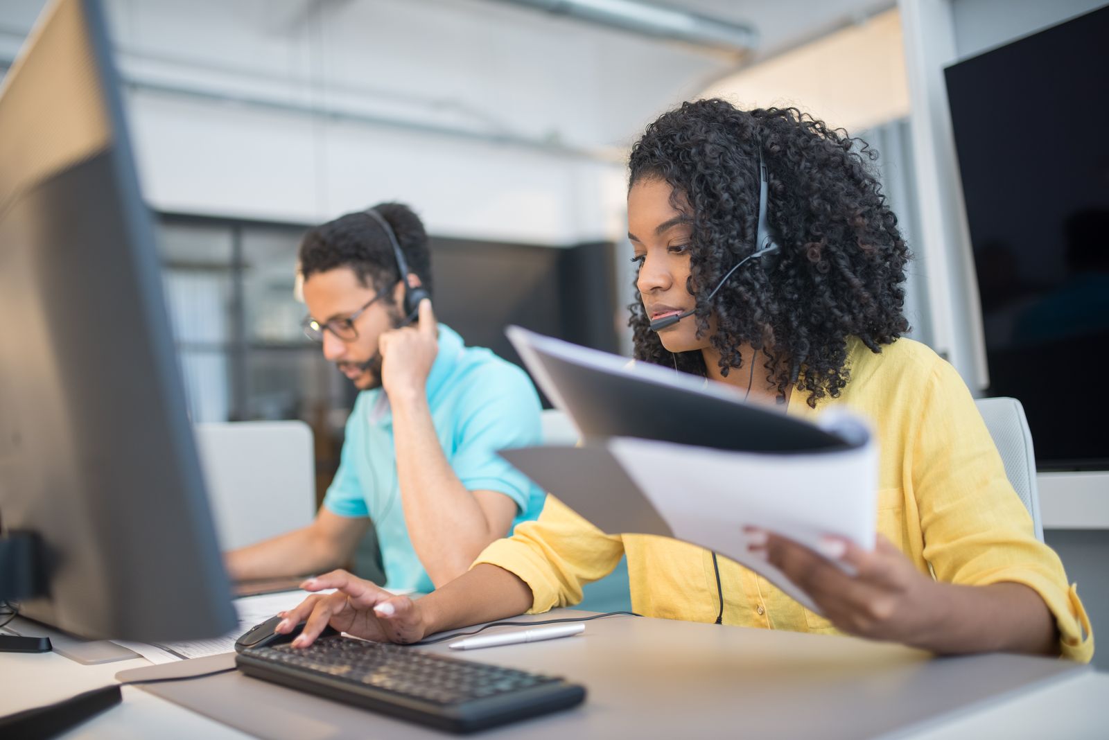 Support representatives with headsets