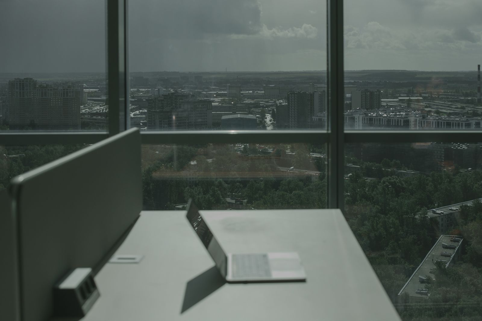 Laptop with a city skyline view