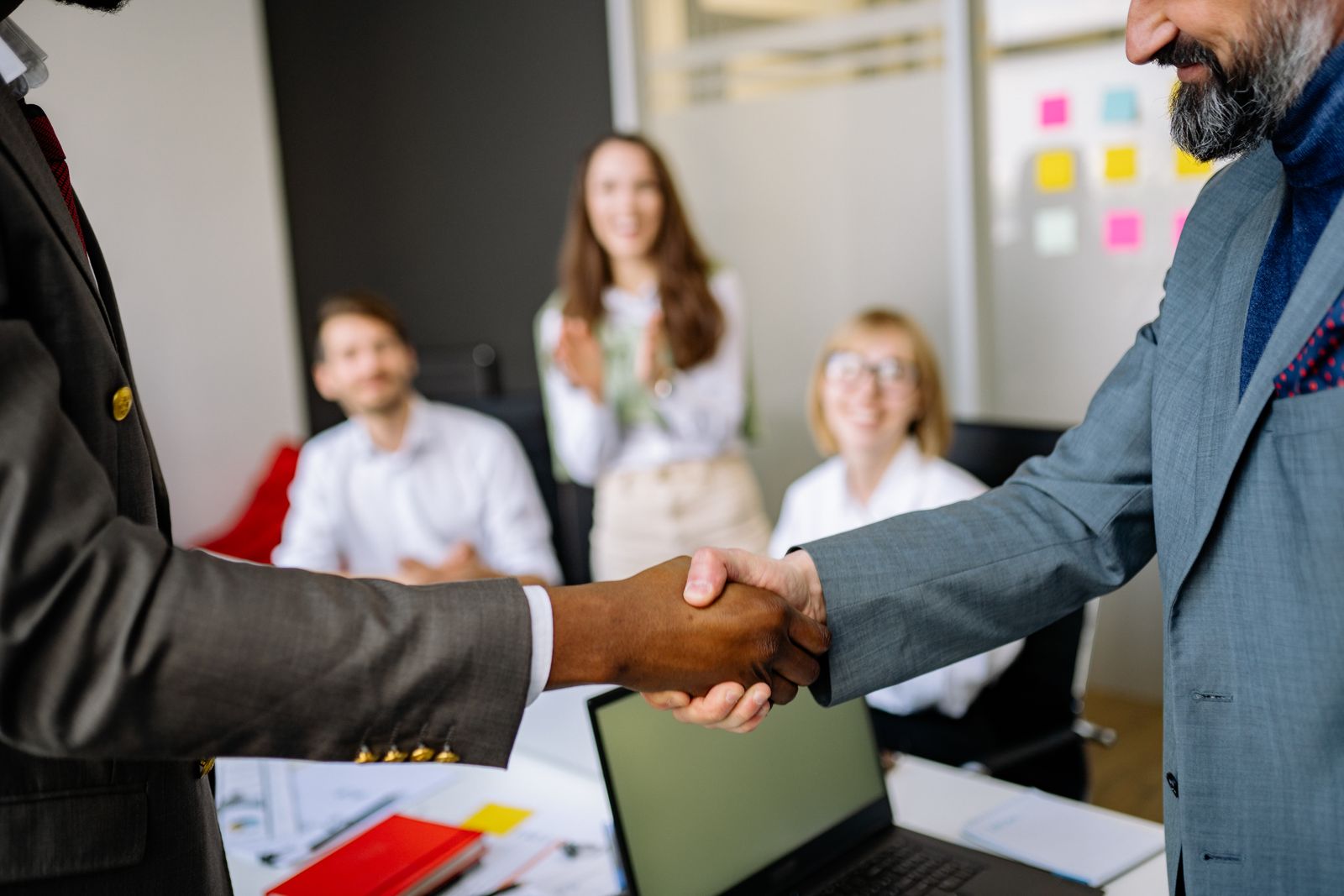 Colleagues shaking hands