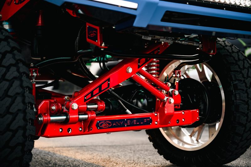 AnyLevel hydraulic 4-link suspension with King coilovers powder coated Illusion Red