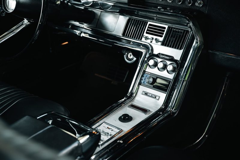 Alpine head unit in the custom console of a 1964 Thunderbird