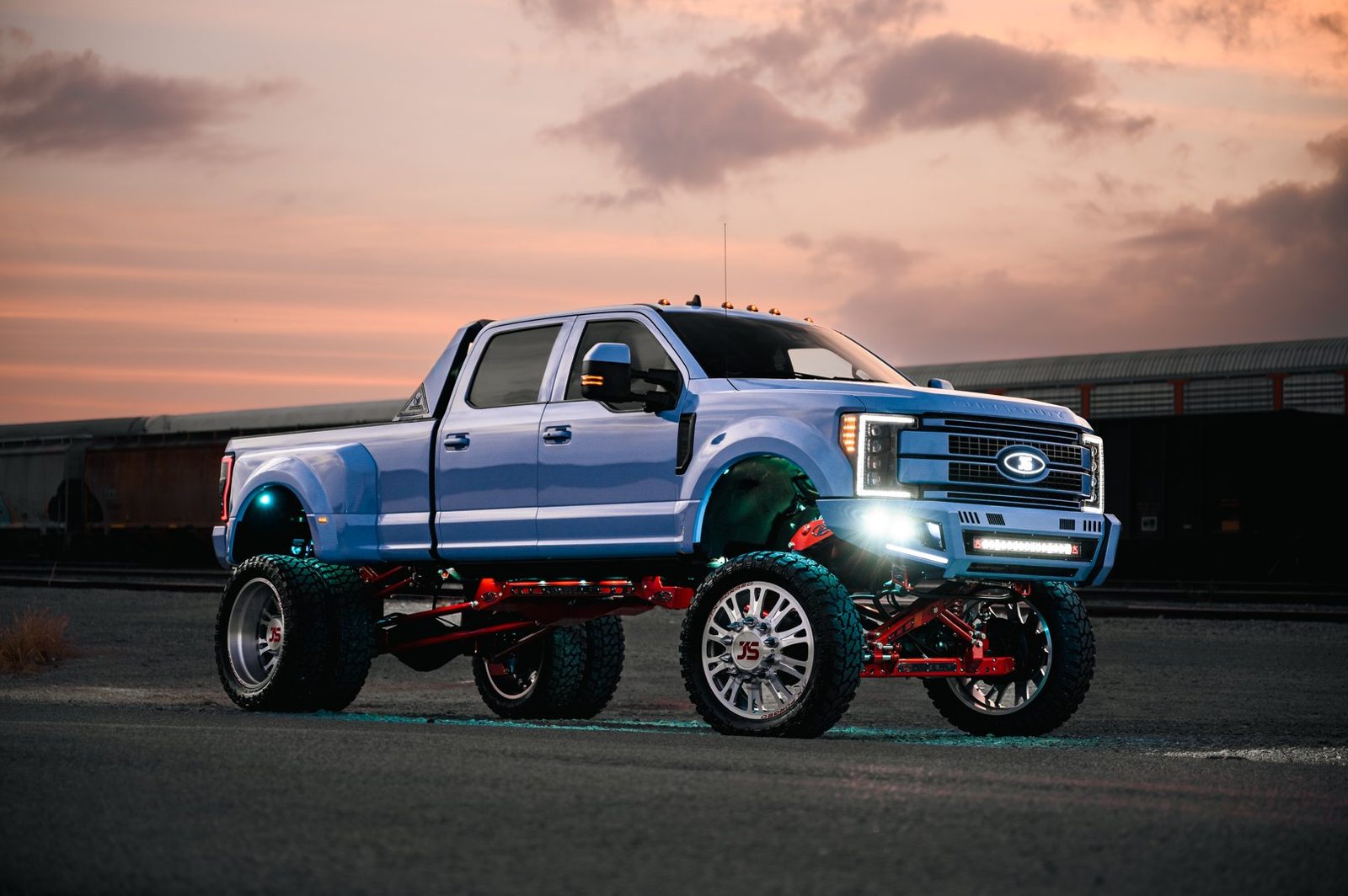 Lifted Ford F-350 dually at sunset, custom Alea leather interior build, Nashville