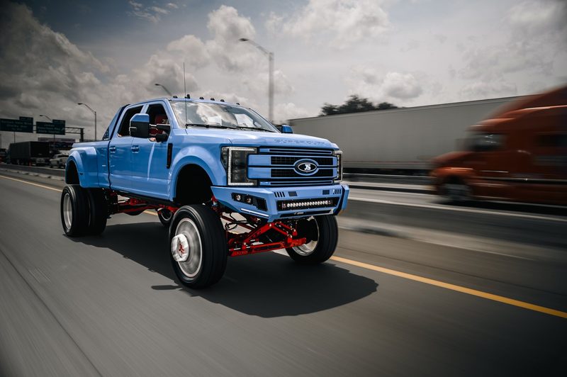 Wrapped Ford F-350 dually rolling on the highway