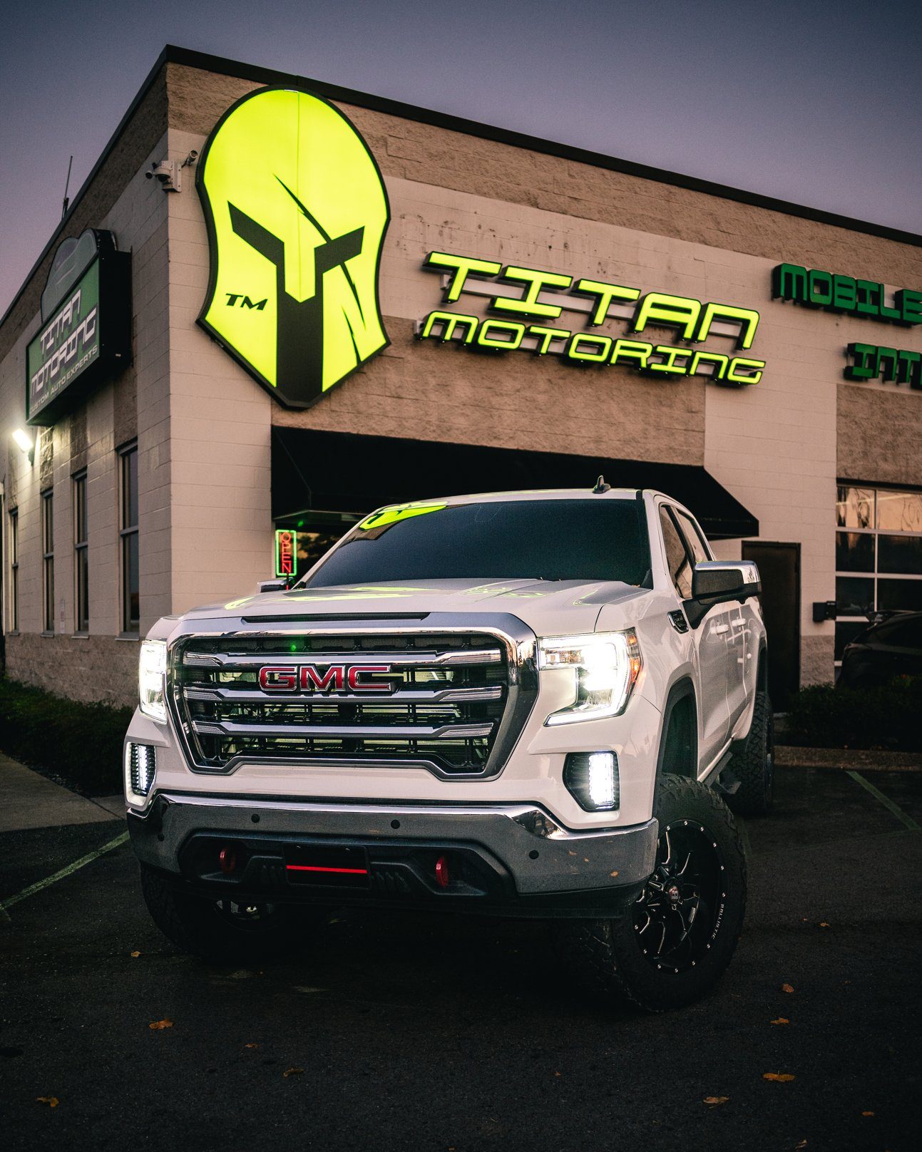 White 2019 GMC Sierra on Ballistic wheels and 35 inch Terra Hunter tires at Titan Motoring, Nashville