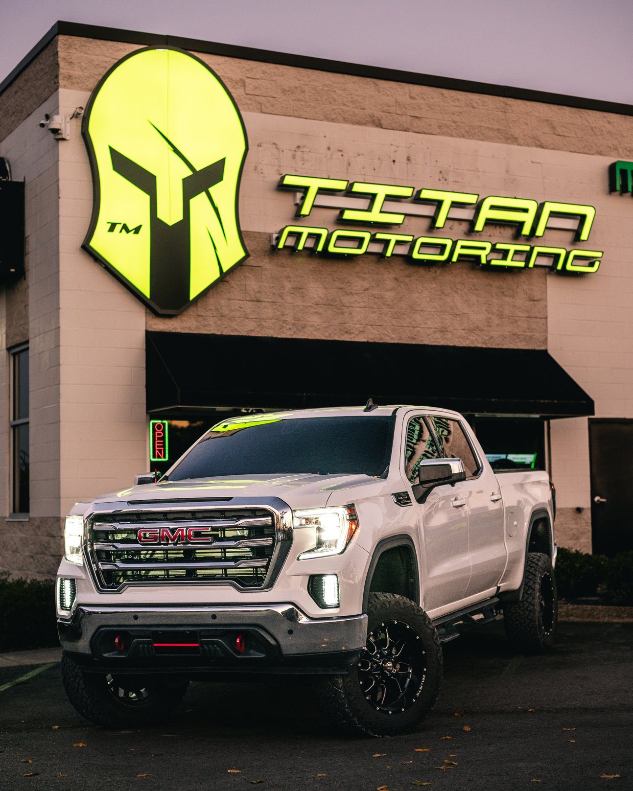 Lifted 2019 GMC Sierra with Cognito 8 inch lift outside Titan Motoring, Nashville