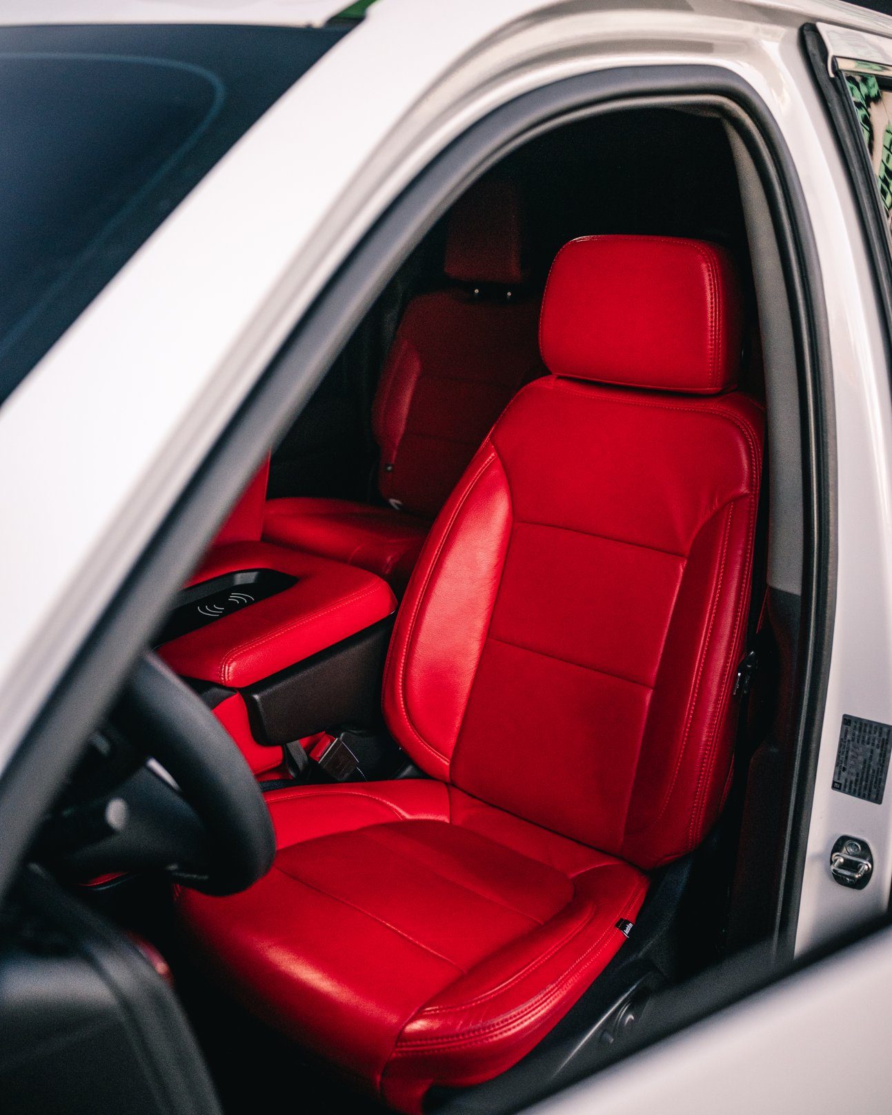 Salsa red two row leather interior in a 2019 GMC Sierra, Titan Motoring Nashville