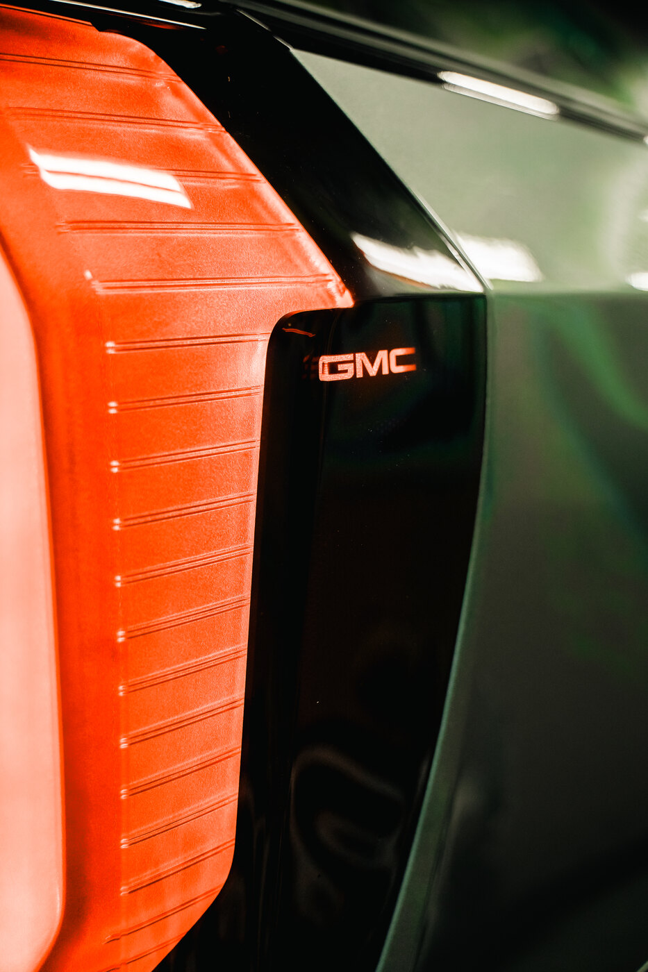 Smoked taillight with illuminated GMC lettering on a Yukon AT4