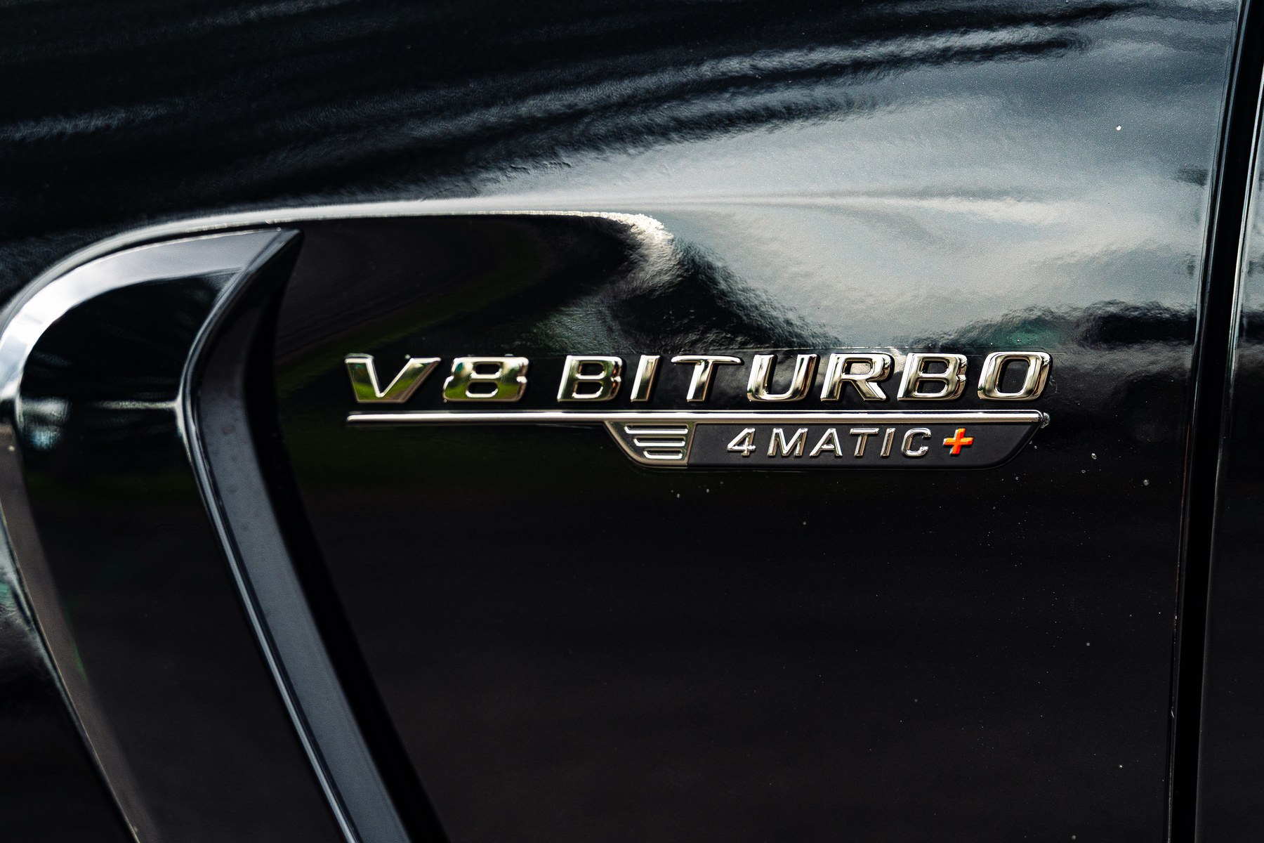 V8 Biturbo 4Matic+ badge on ceramic-coated paint after two-stage correction