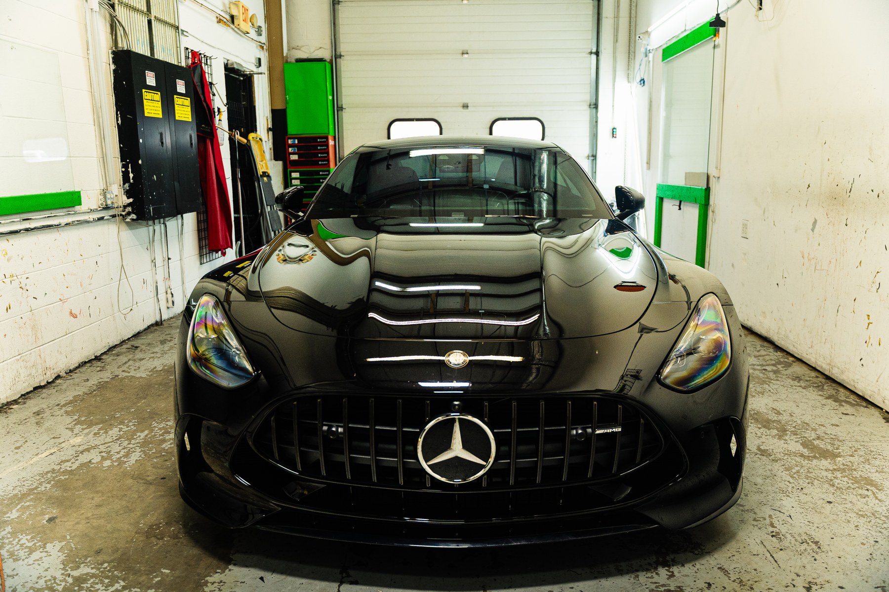 Mercedes-AMG GT 55 with Stage 3 XPEL XRPlus ceramic window tint in the Titan Motoring install bay
