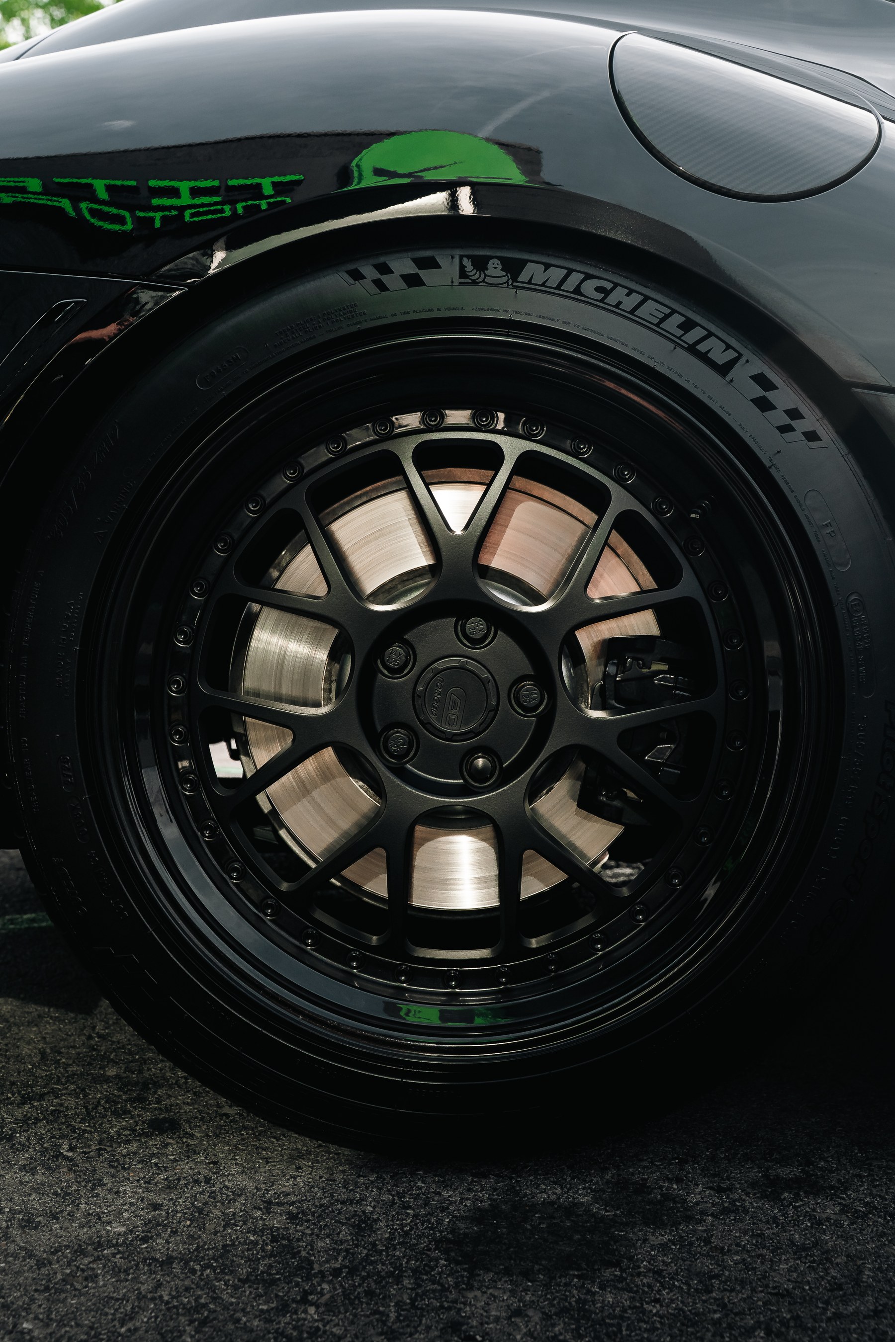 Bronze wheel and Michelin tire detail on a Toyota GR Supra